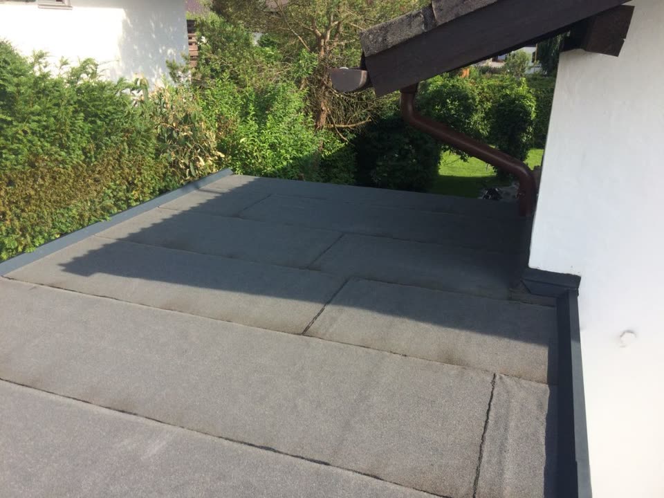 Flachdach – Foto 1 von 2